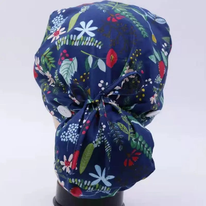Showlu Fashion 100% cotton printed scrub cap, adjustable for long hair, suitable for doctors and nurses, with a colorful floral pattern.