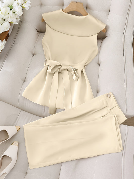 A Stylish And Elegant Sleeveless Top And Long Pants Set in a Solid Color Designed to Attract Wealth.