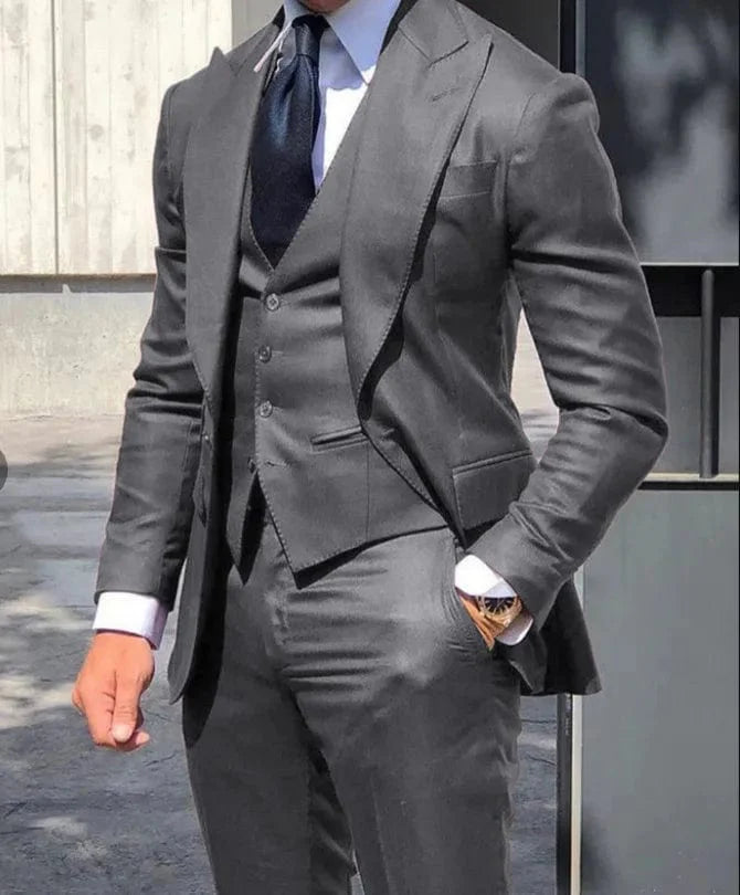 Black men's 3-piece slim fit suit with jacket, vest, and pants, ideal for weddings and formal business occasions.