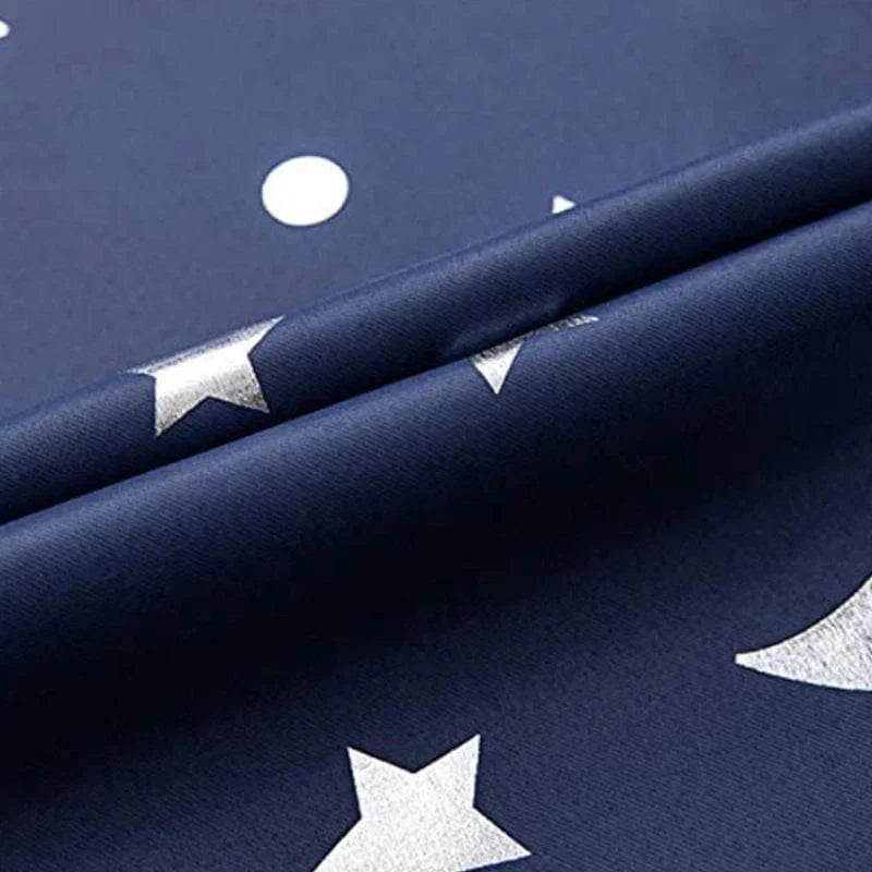 Blackout curtains for kids bedroom featuring stars and moon design in navy and gray, perfect for boys' bedroom or living room windows.