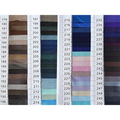 A fabric swatch catalog displaying a wide variety of colors and textures for custom suits.