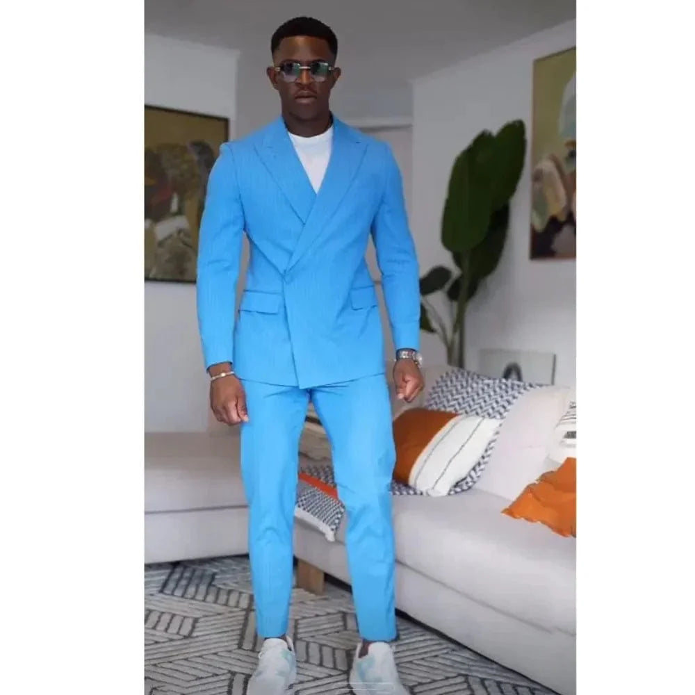 Blue men's 2-piece suit with slim fit, peak lapel, and one-button blazer from SHOWLU FASHION for wedding or formal occasions.