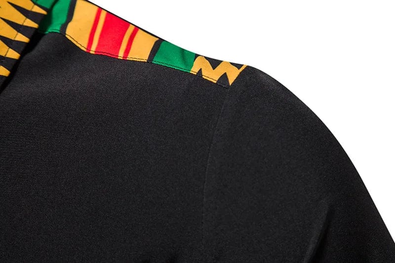 Men's short sleeve cotton button-down shirt with bold Kente print by Showlu Fashion, showcasing vibrant African-inspired fabric.