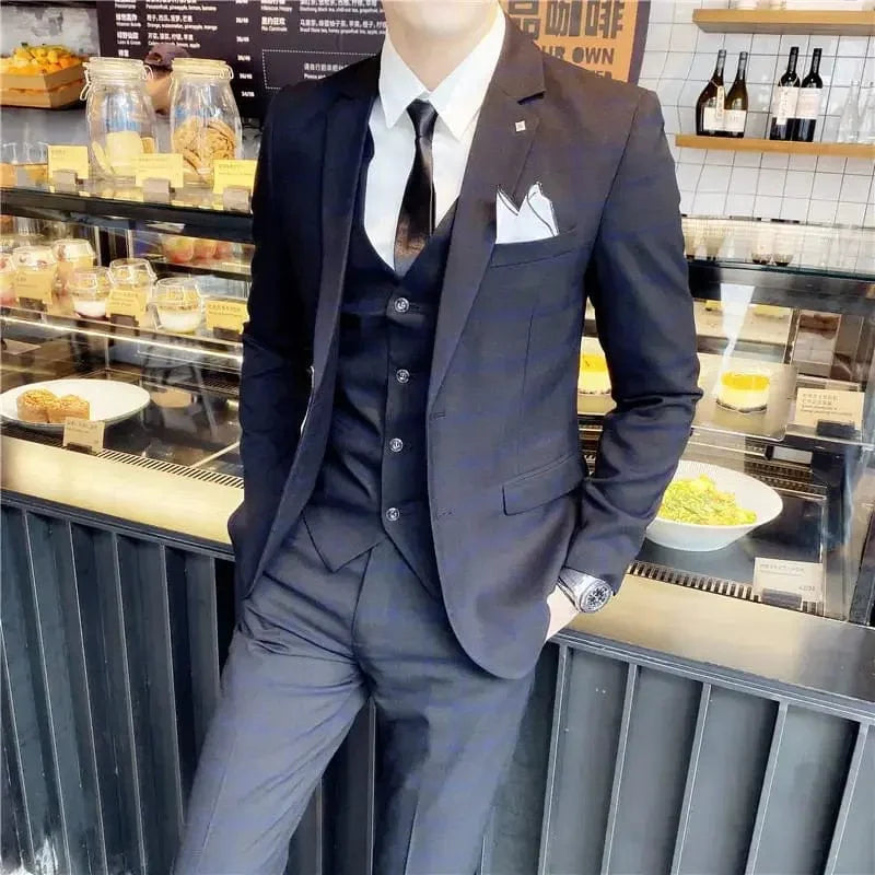 Men's 3-piece slim fit business suit by Showlu Fashion, includes blazer, vest, and trousers in elegant formal and casual styles.