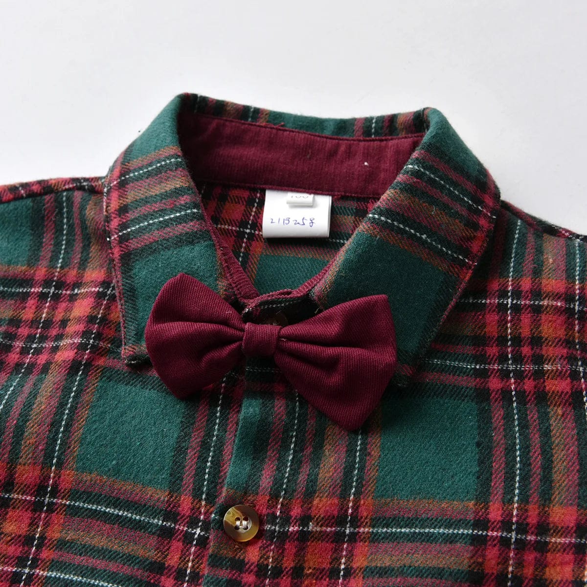 Boy's Christmas plaid dress suit by Showlu Fashion with formal cotton shirt, pants, and bowtie for festive occasions.