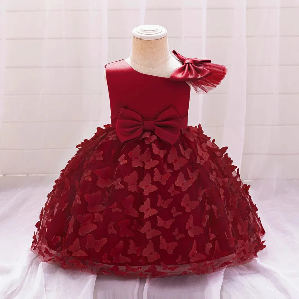 White butterfly tulle baptism and wedding gown for baby girls by SHOWLU FASHION STORE, featuring a bow, floral accents, and tutu skirt.