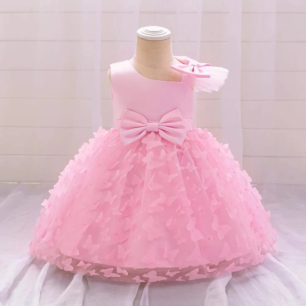 White butterfly tulle baptism and wedding gown for baby girls by SHOWLU FASHION STORE, featuring a bow, floral accents, and tutu details.