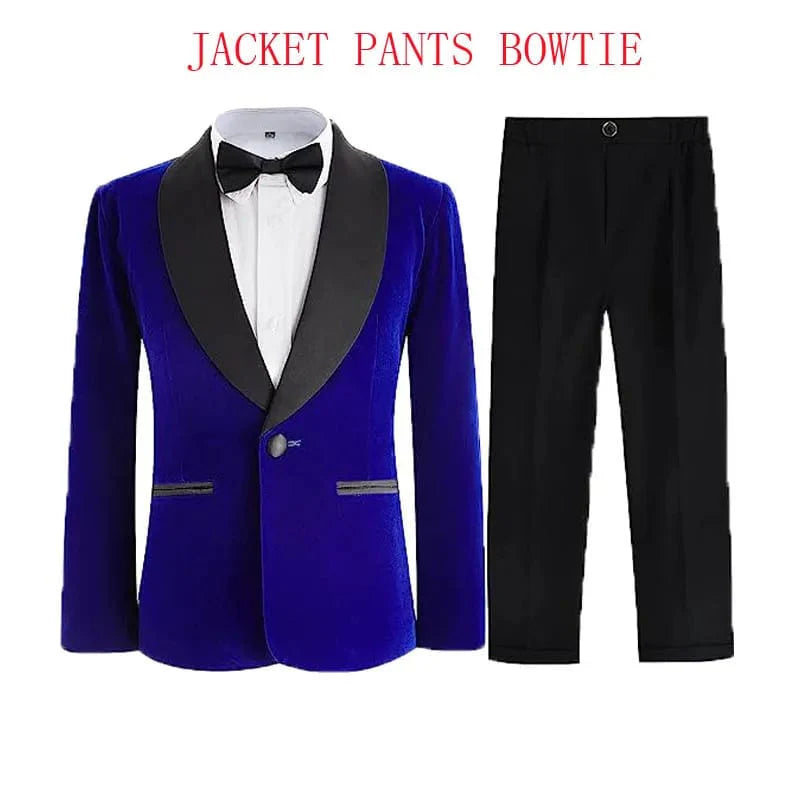 Boy wearing SHOWLU FASHION velvet 3-piece suit with blazer, pants, and bowtie, suitable for formal events and special occasions.
