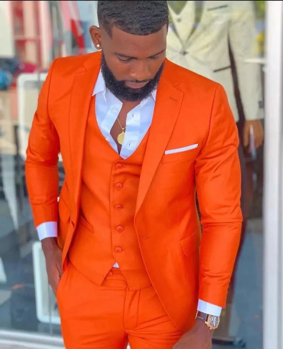 Bright orange men's slim fit 3-piece suit with notch lapel, tuxedo style, suitable for wedding, prom, or formal events.
