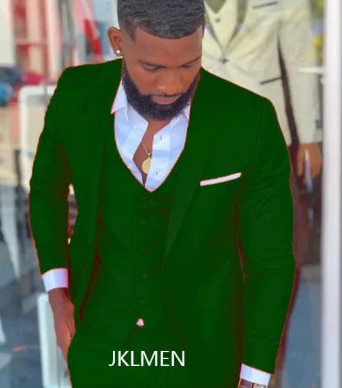 Bright orange slim fit men's 3-piece tuxedo with notch lapel, groom or prom suit, featuring blazer, vest, and trousers.