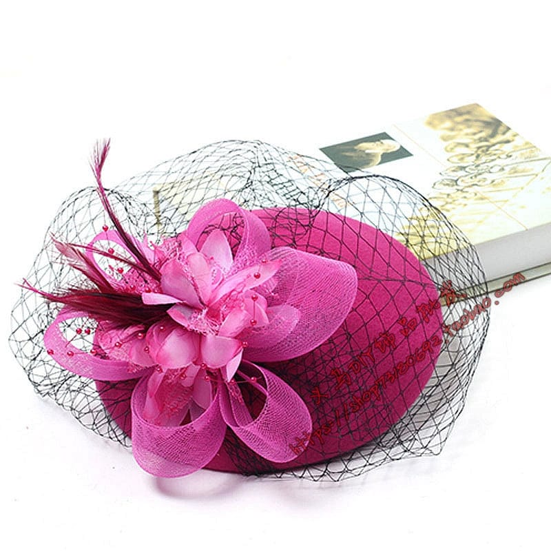 Black vintage gauze Billycock hat with British style, featuring yarn hair clip, worn by a celebrity in traditional cheongsam attire.