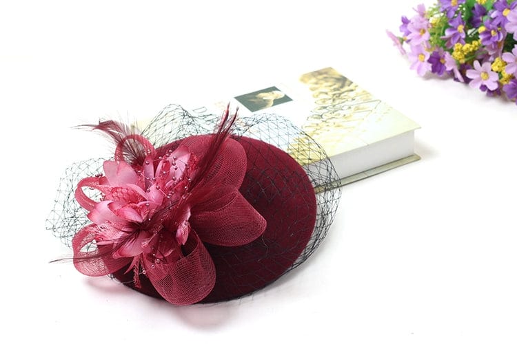 Black vintage gauze Billycock hat with British style yarn hair clip, worn by a British celebrity in a cheongsam dress.