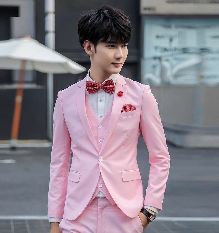 Original Charm men's pink three-piece slim fit suit, solid color business and wedding attire with jacket, vest, and trousers.