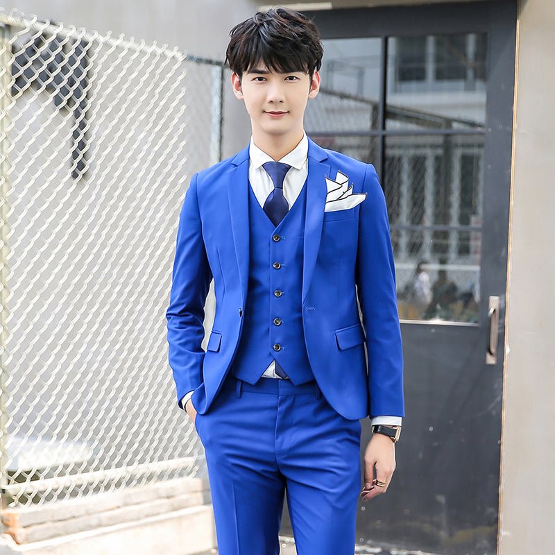 Original Charm men's pink three-piece slim fit suit, solid color business and wedding attire with jacket, vest, and trousers.