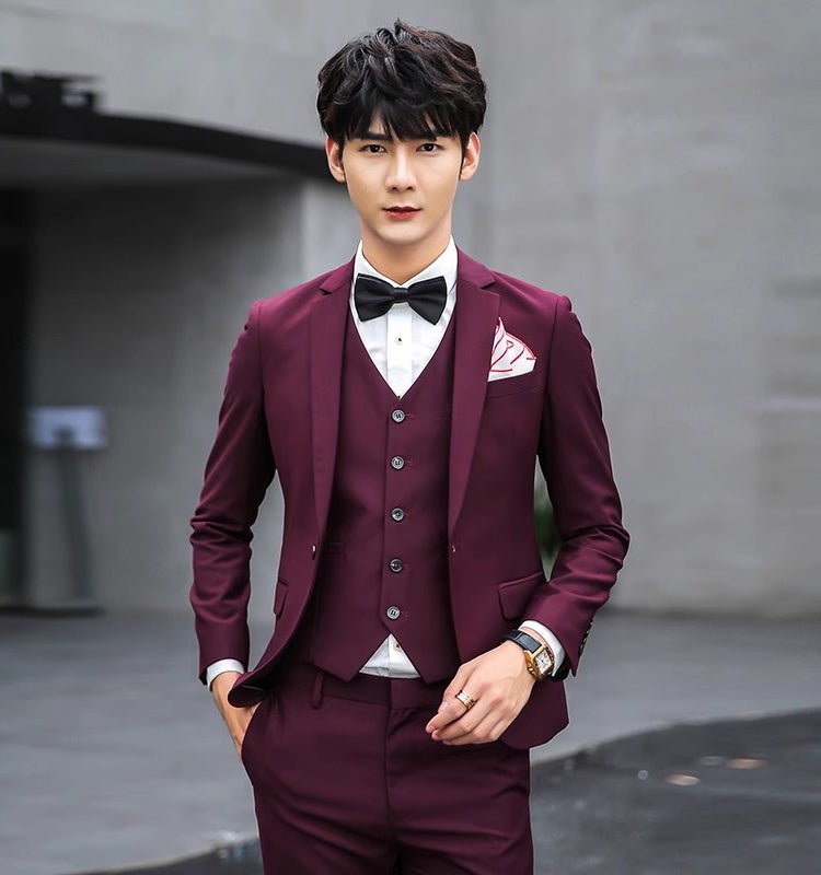 Original Charm men's pink three-piece slim fit suit, solid color business casual and wedding attire with jacket, vest, and trousers.