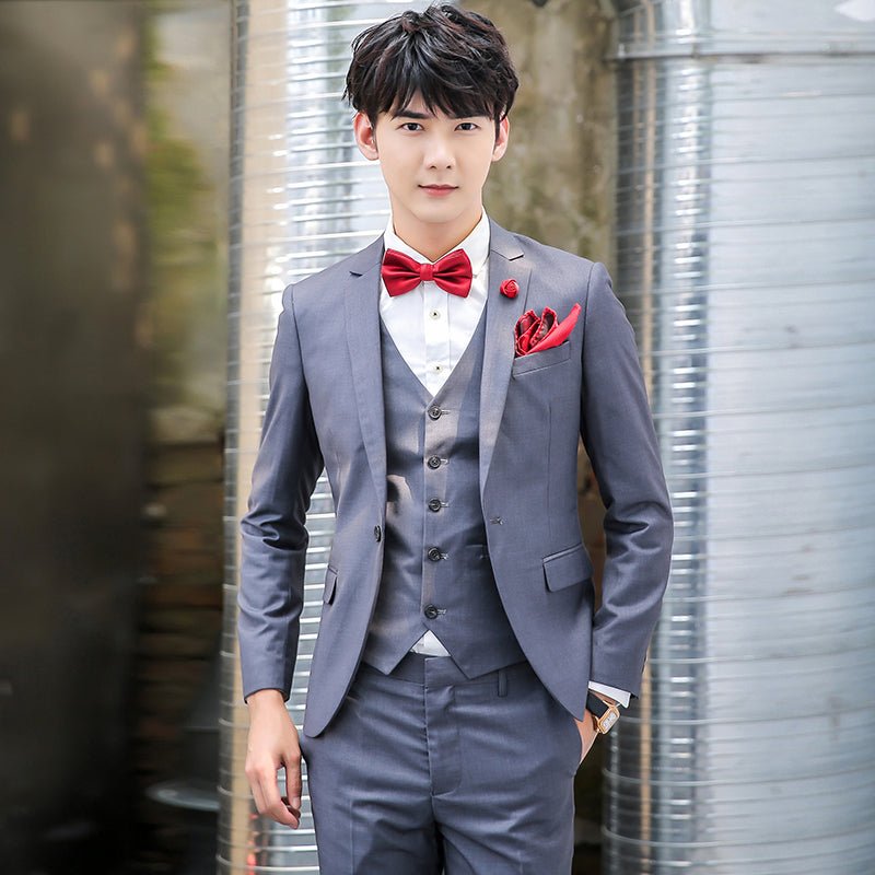 Original Charm men's pink three-piece slim fit suit, solid color business and wedding attire, with jacket, vest, and trousers.