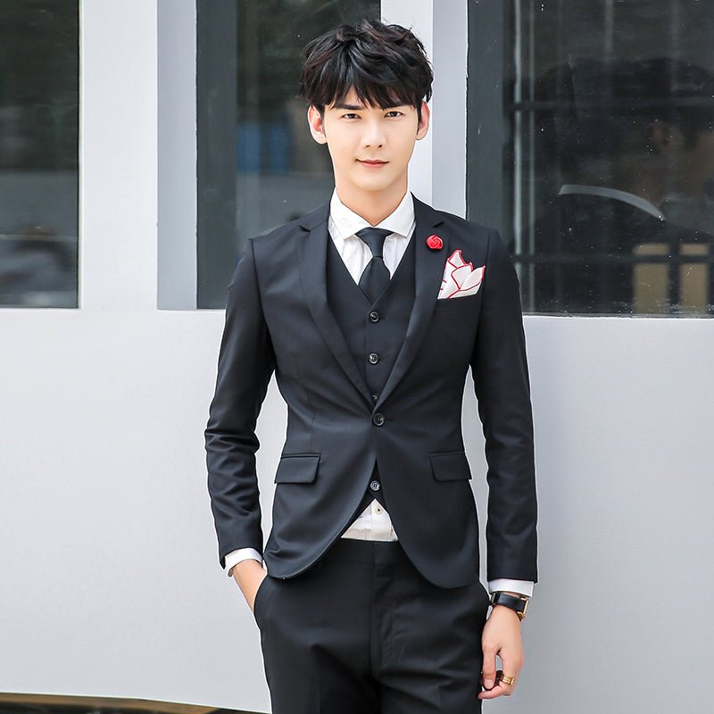 Original Charm men's pink three-piece slim fit suit, solid color business and wedding attire, with jacket, vest, and trousers.