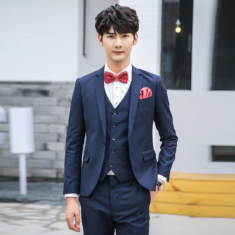 Original Charm men's pink three-piece slim fit suit, solid color business and wedding attire, tailored for a sharp, modern look.