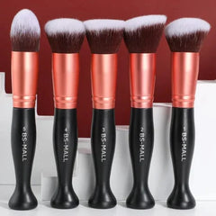A set of five BS-MALL makeup brushes with black handles and rose gold ferrules standing upright.