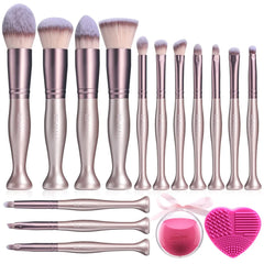 A 14-piece set of rose gold makeup brushes with synthetic bristles, a sponge, and a heart cleaner.