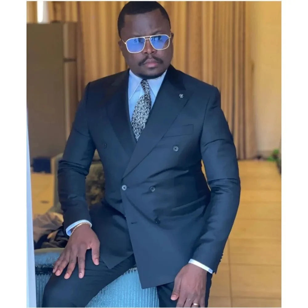 Men's double-breasted slim fit wedding tuxedo by Showlu Fashion, featuring peaked lapel, tailored blazer, and matching pants.