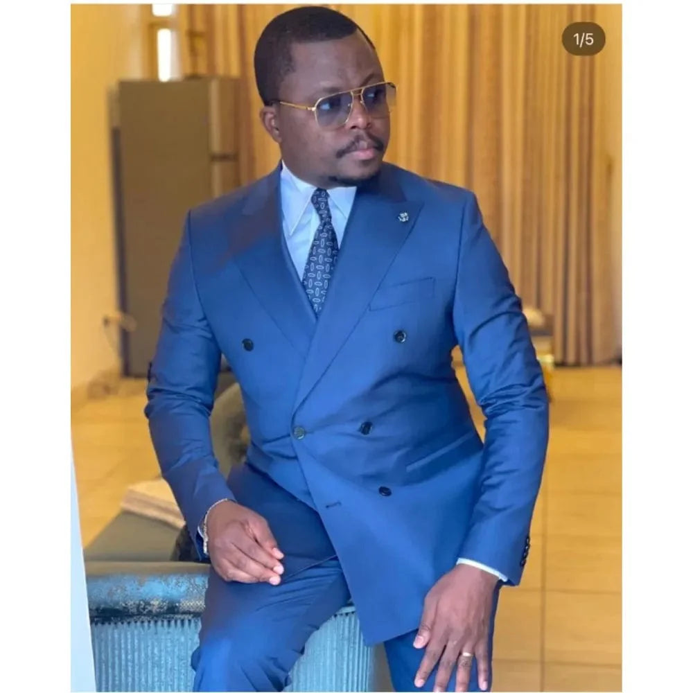Men's double-breasted slim fit wedding tuxedo by Showlu Fashion, featuring peaked lapels, tailored blazer, and matching trousers.