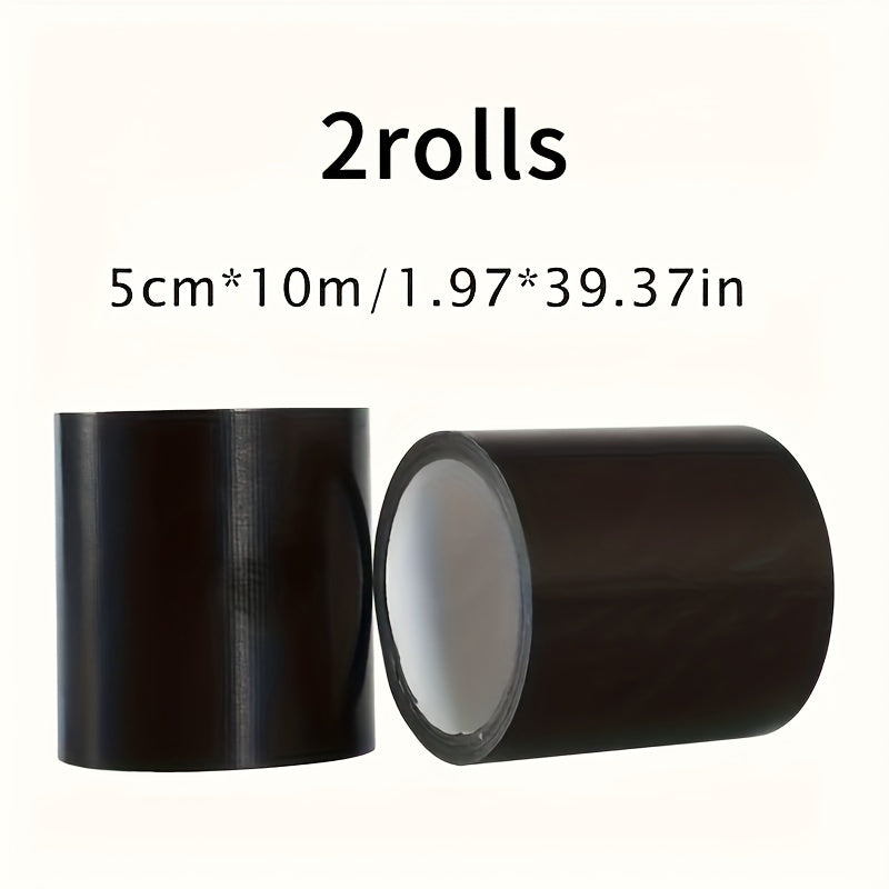 Black PVC cloth repair tape by SHOWLU FASHION STORE, waterproof and durable, shown rolled out on a flat surface.