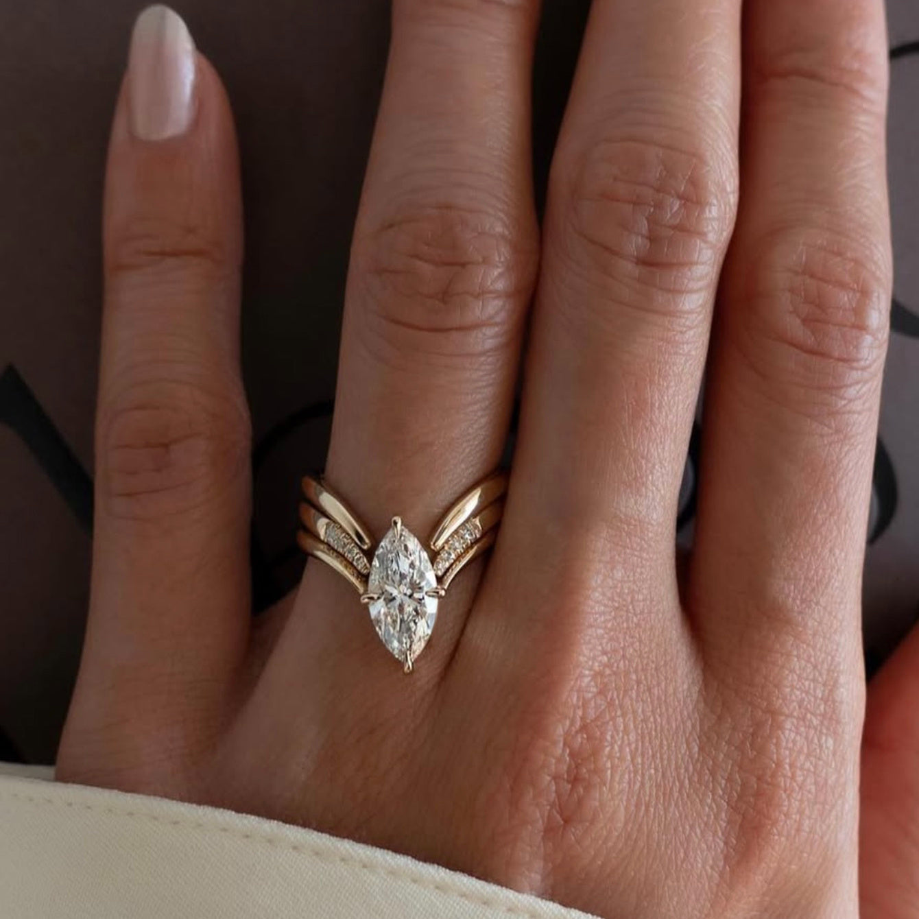 Showlu Fashion 2CT marquise moissanite ring in 18K gold plated S925 silver, showcasing an elegant marquise-cut gemstone design.
