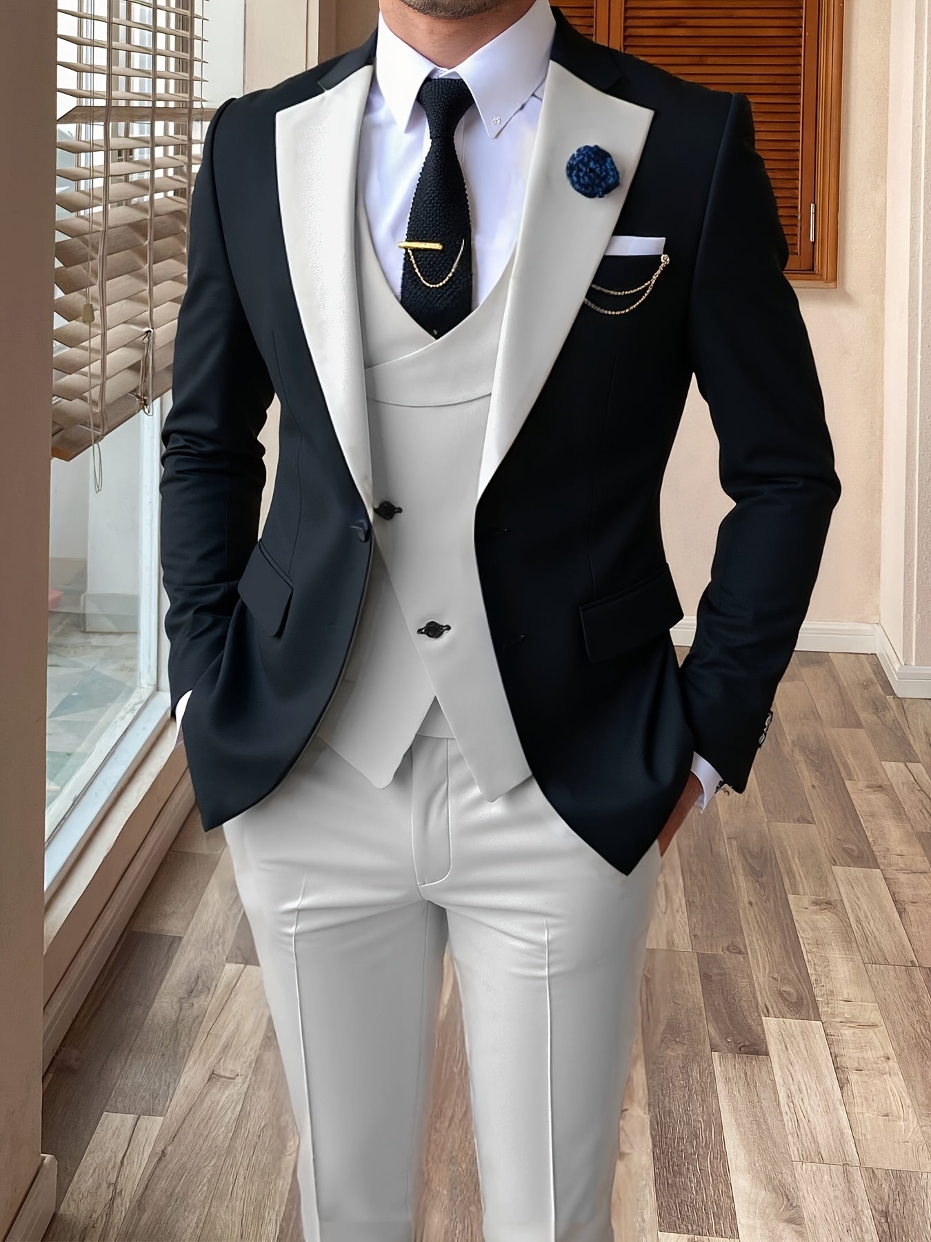 Showlu Fashion men's 3-piece color block slim fit tuxedo suit set, including jacket, vest, and trousers, styled for formal occasions.