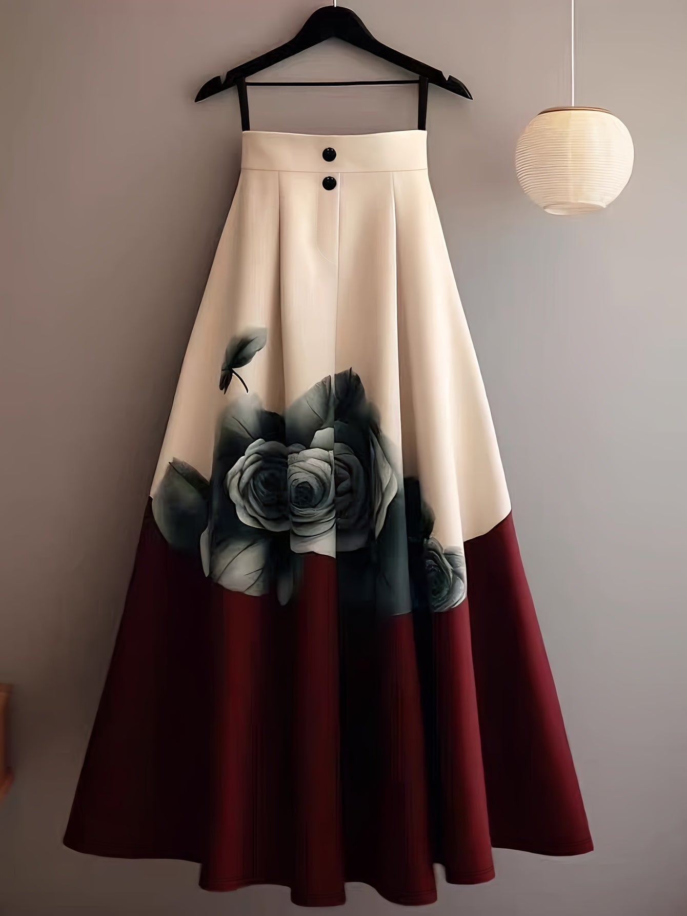 Beige and red floral print midi skirt by SHOWLU FASHION with A-line cut and rose pattern, displayed on a hanger.