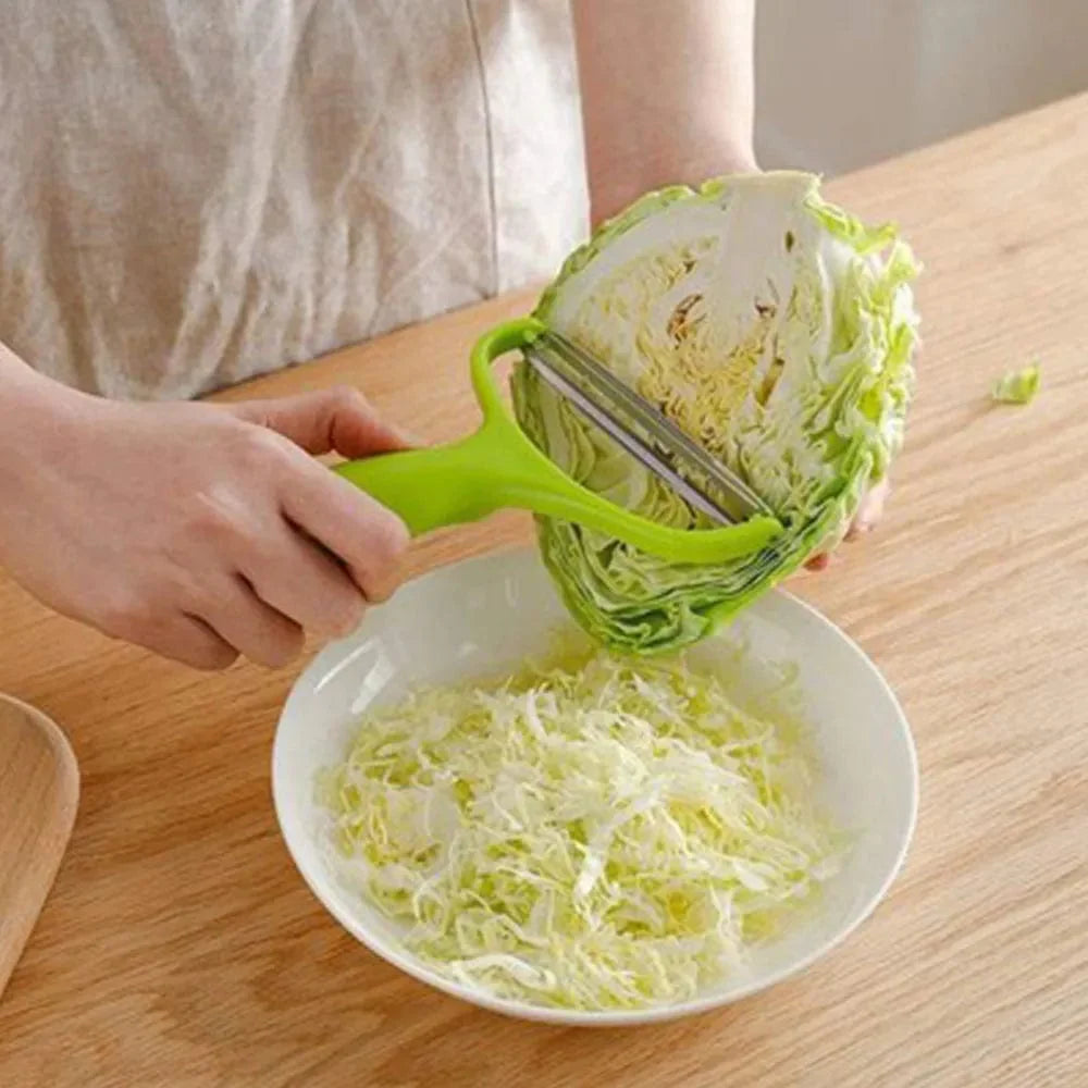 Showlu Fashion Store LEENKEA cabbage slicer and vegetable grater with stainless steel blades for shredding cabbage, carrots, and cucumbers.