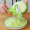 Showlu Fashion Store LEENKEA cabbage slicer and vegetable grater with stainless steel blades for shredding cabbage, carrots, and cucumbers.