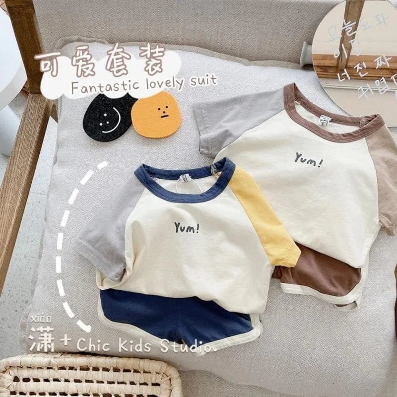 Showlu Kids cartoon cotton T-shirt and shorts 2-piece summer outfit set featuring colorful, trendy matching T-shirt and shorts for boys.