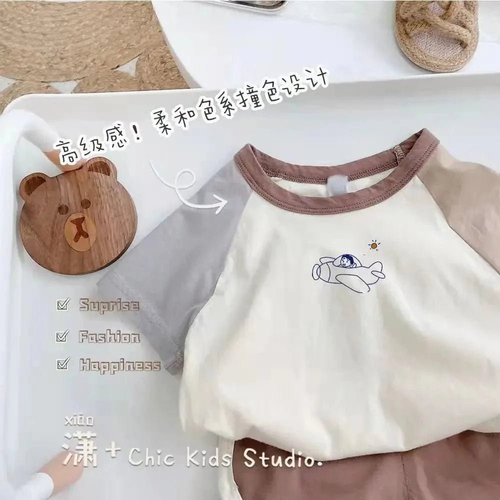 Showlu Kids cartoon cotton T-shirt and shorts 2-piece summer outfit set for boys, featuring colorful, trendy matching t-shirt and shorts.