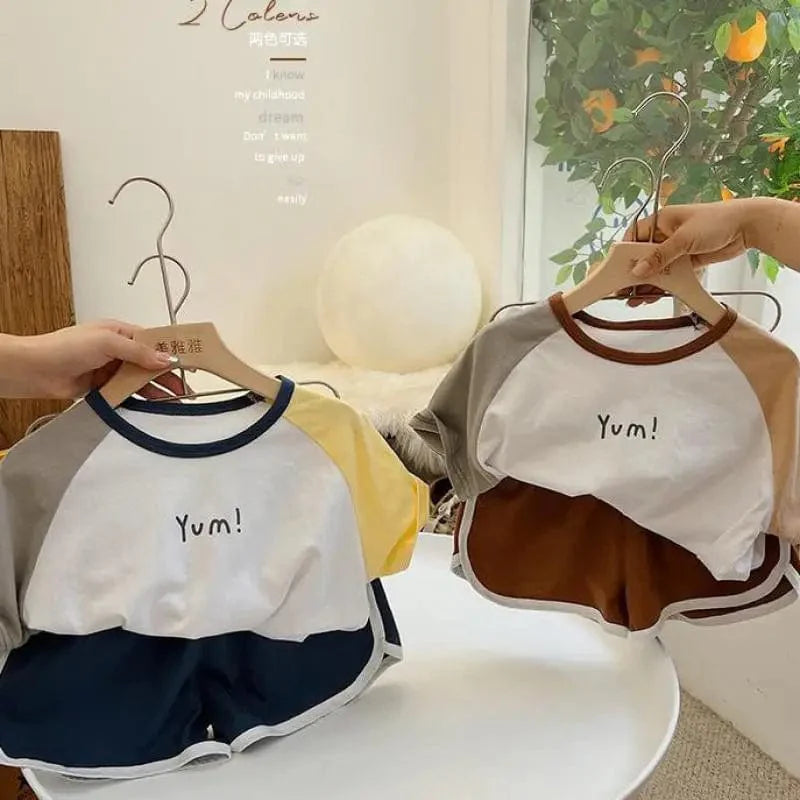 Showlu Kids cartoon cotton T-shirt and shorts summer 2-piece set with colorful, trendy matching T-shirt and shorts for boys and girls.