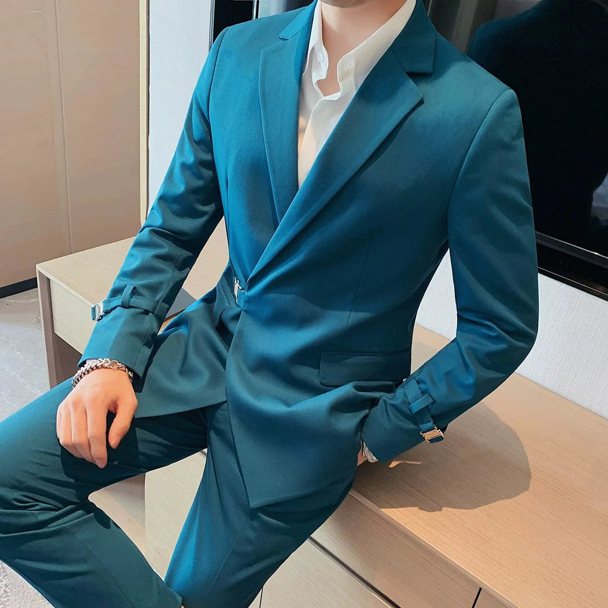 Showlu men's slim fit double-breasted business leisure suit jacket with casual British-inspired design and French side buckle details.