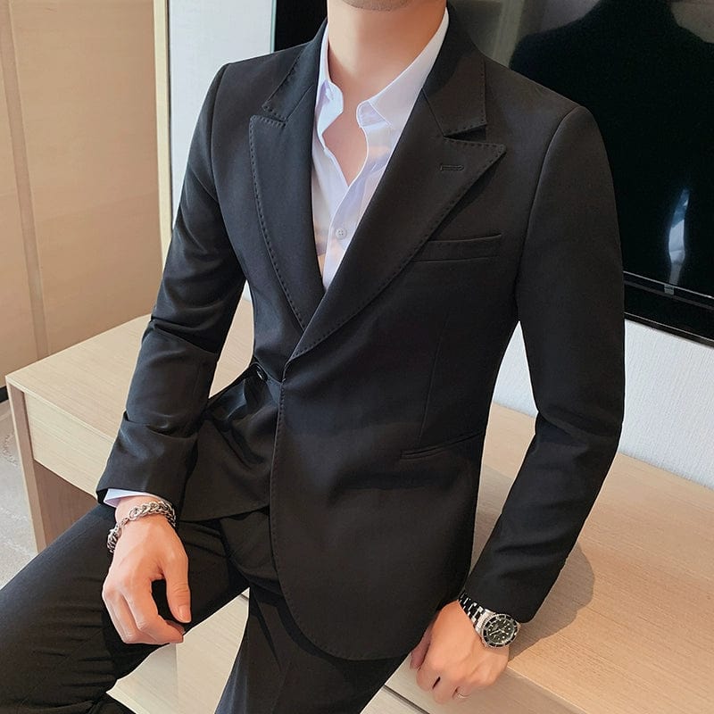 Showlu men's slim fit double-breasted business leisure suit jacket with stylish British-inspired design and French side buckle detail.