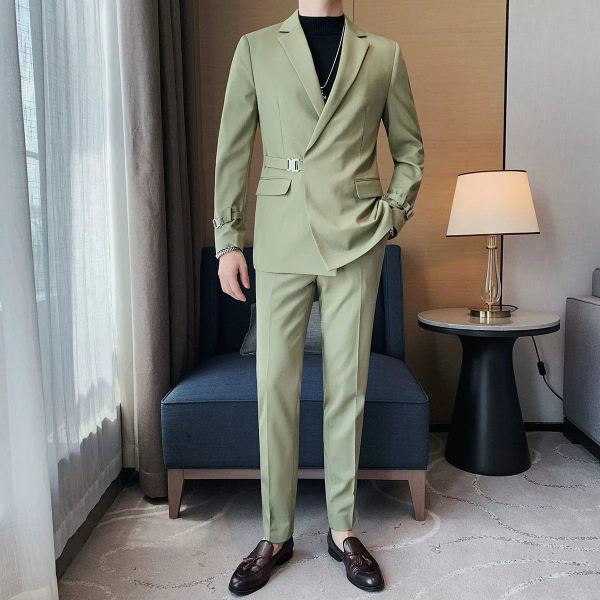 Showlu men's slim fit double-breasted business leisure suit jacket with casual British style and French side buckle details.