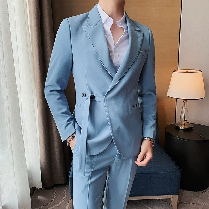 Showlu Men's slim fit double-breasted business leisure suit jacket in light British style with French side buckle detail.