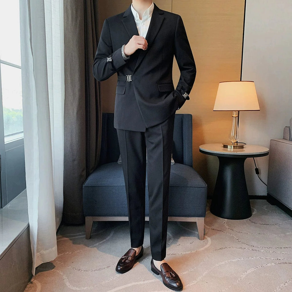 Showlu men's slim fit double-breasted business leisure suit jacket with a casual British-inspired design and French side buckle detail.