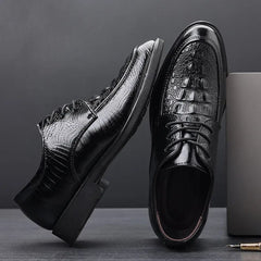 A pair of black lace-up dress shoes for men featuring a textured crocodile-patterned PU leather.
