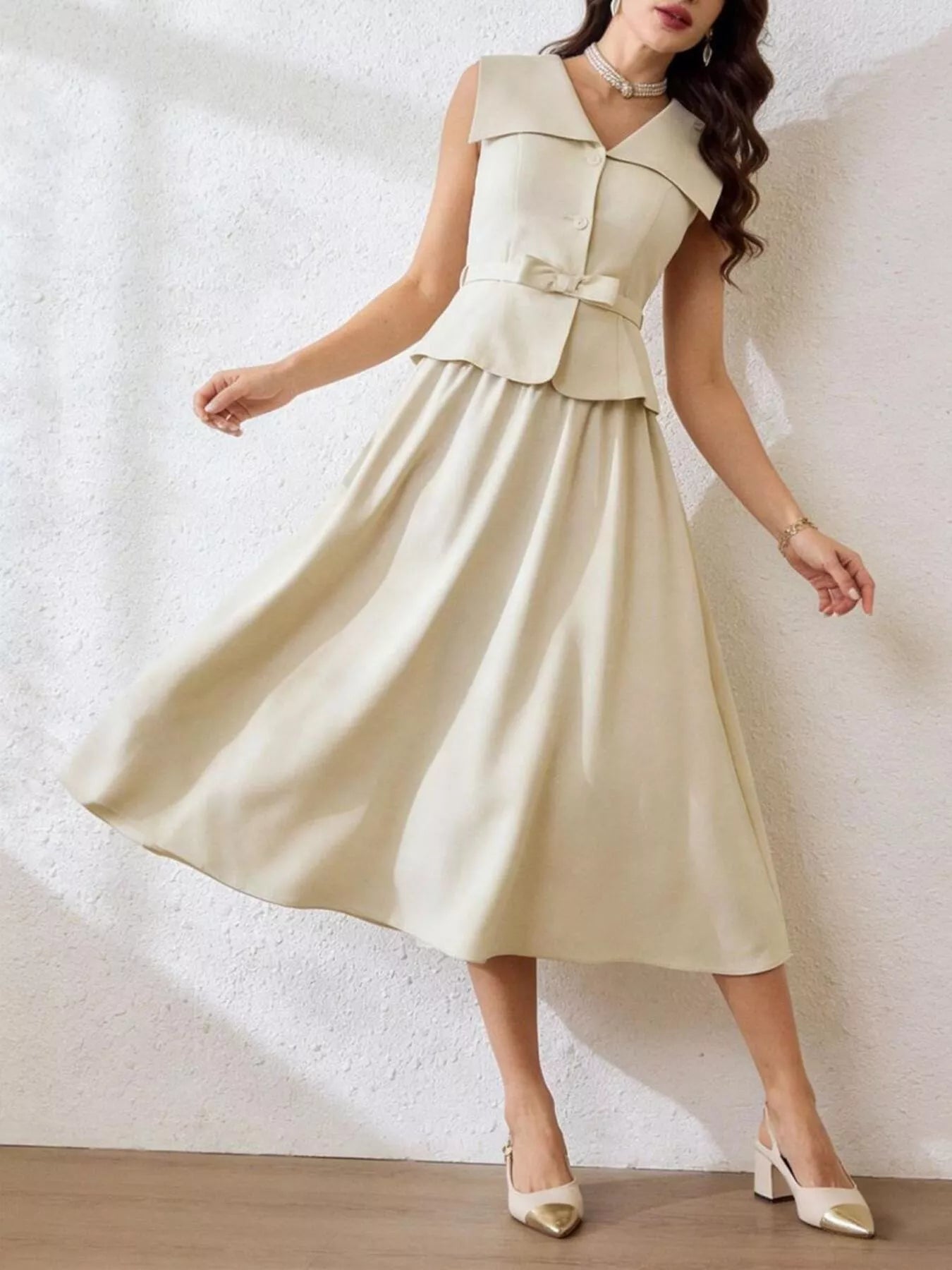Sleeveless top and midi skirt set by Trendsi, featuring a stylish matching outfit with a sleeveless top and flowy midi skirt.