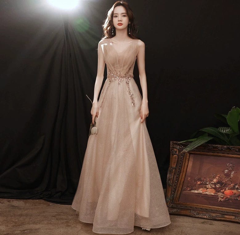 Showlu Fashion champagne embroidered evening gown with elegant mid-length design, featuring musical and artistic details.