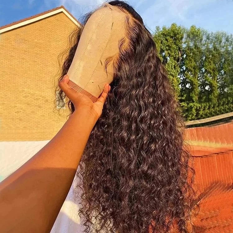 Showlu HD transparent deep curly lace frontal wig made of virgin Brazilian human hair, showcasing full lace and natural wave pattern.