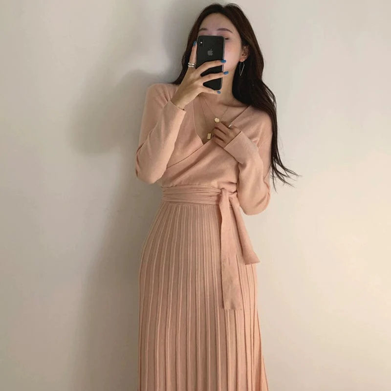 Chic SHOWLU FASHION slimming pleated knit V-neck long sleeve maxi dress with lace-up detail and elegant design.