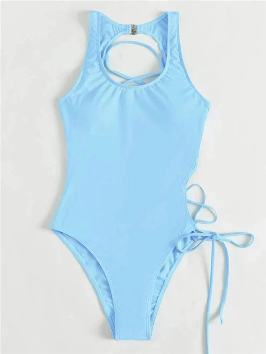 Showlu Fashion women's backless printed one-piece swimsuit with lace-up back design, perfect for stylish beachwear.