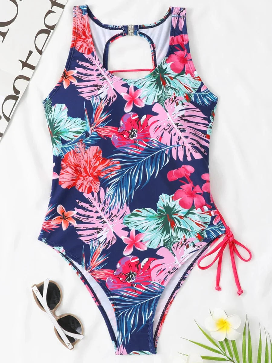 Showlu Fashion women's backless one-piece printed swimsuit with lace-up back design, stylish and perfect for swimming or beachwear.
