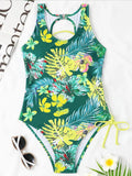 Showlu Fashion women's backless printed one-piece swimsuit with lace-up design, featuring a stylish and chic swimwear look.