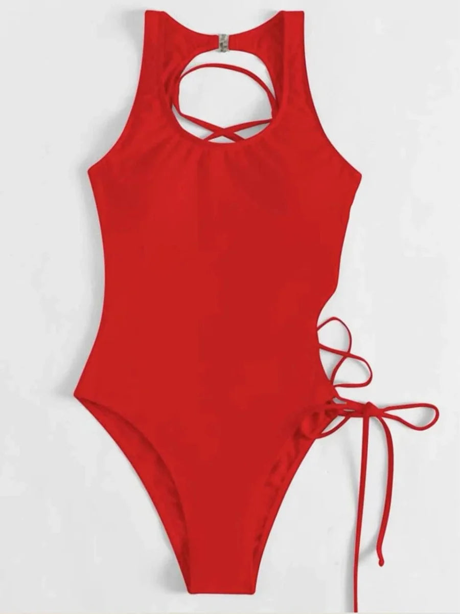 Showlu Fashion women's backless one-piece printed swimsuit with lace-up design, ideal for stylish beach or poolside wear.