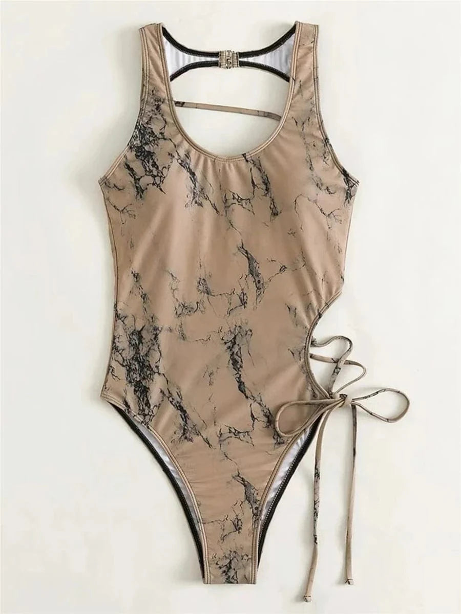 Showlu Fashion women's lace-up backless printed one-piece swimsuit with stylish design and vibrant pattern, perfect for beachwear.